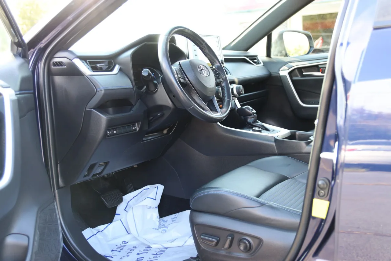 2019 Toyota RAV4 Hybrid XSE Sport Utility 4D in Blue — photo 13 of 38