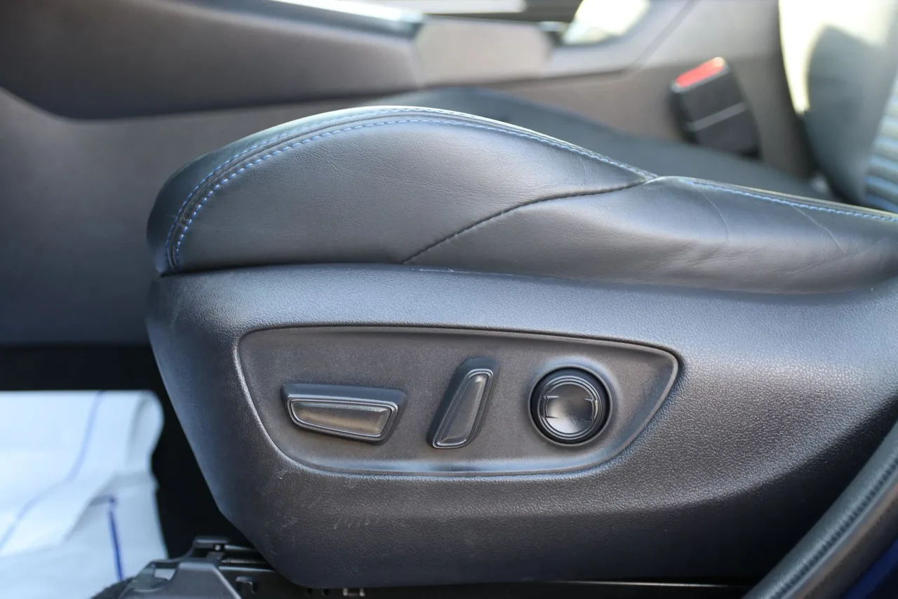 2019 Toyota RAV4 Hybrid XSE Sport Utility 4D in Blue — photo 16 of 38