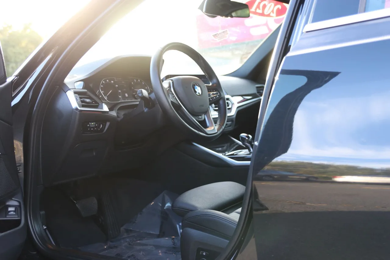 2021 BMW 3 Series 330i xDrive Sedan 4D in Black — photo 13 of 43